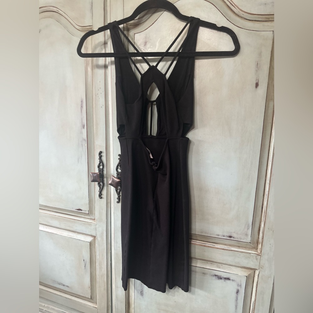 Black cut out mini dress, worn one time.
